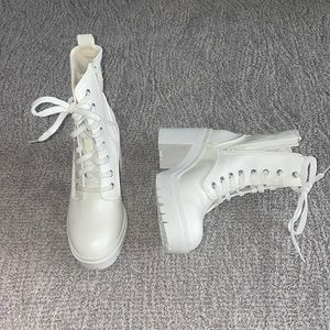 Off white heeled boots with laces and functional zipper